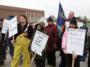 Striking teachers picket at Lasalle Secondary School in Sudbury on Tuesday May 12, 2015. John Lappa/Sudbury Star/Postmedia Network