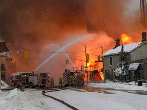 KIngston fire crews battle a massive fire at a construction site for student housing on Princess and Victoria streets in downtown Kingston on Dec. 17, 2013. (Ian MacAlpine/The Whig-Standard)