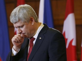 Canada's Prime Minister Stephen Harper takes part in a news conference with Philippines' President Benigno Aquino (not pictured) on Parliament Hill in Ottawa May 8, 2015. REUTERS/Chris Wattie