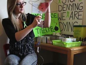 Paige Spencer in her old bedroom that she now calls her "drug room " on May 13, 2015. She suffers from Lyme disease. (Veronica Henri/Toronto Sun)