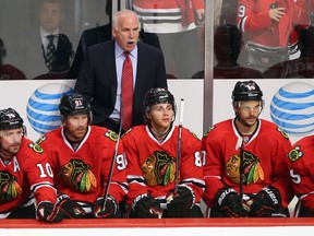 Chicago Blackhawks head coach Joel Quenneville and Ducks' coach Bruce Boudreau were teammates on the Maple Leafs for almost two seasons. (Jerry Lai/USA TODAY Sports)