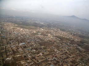 An aerial view of Kabul near Hamid Karzai International Airport February 22, 2015. (REUTERS/Jonathan Ernst)