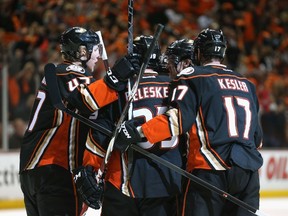Hampus Lindholm #47 of the Anaheim Ducks celebrates his first period goal with teammates Matt Beleskey #39, Ryan Kesler #17 and Jakob Silfverberg #33 in Game One of the Western Conference Finals during the 2015 NHL Stanley Cup Playoffs at Honda Center on May 17, 2015 in Anaheim, California. (Stephen Dunn/Getty Images/AFP)