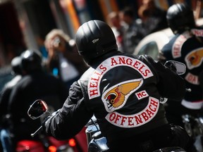 Members of motorcycle club "Hells Angels" and other motorcyclists take part in the 'Crime City Run' as a protest against the ban of Westend and Frankfurt chapters of the Hells Angels motorcycle club in Frankfurt July 14, 2012. About 1,000 motorcyclists took part in the demonstration.  REUTERS/Kai Pfaffenbach