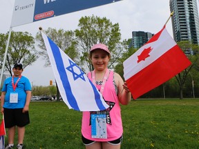 Thousands turned out for the 48th annual Walk With Israel in Toronto, including nine-year-old Sarah. (DAVE THOMAS/Toronto Sun)