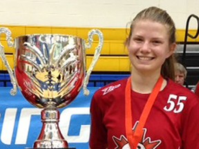 Belleville's Hannah Wilson with the Canada Cup floorball tournament trophy.