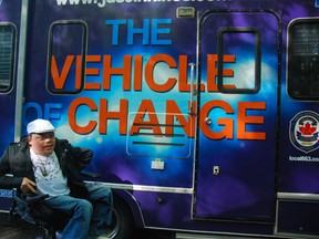 Justin Hines in front of his fully accessible RV.