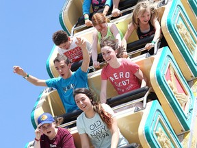 Thrilll seekers ride the Pharaoh's Fury at the World's Finest Shows carnival at the Hanmer Valley Shopping Centre in Sudbury, Ont. on Monday May 18, 2015. The carnival runs from May 14-25. Gino Donato/Sudbury Star/Postmedia Network