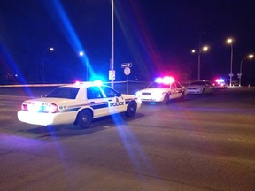 Heavy police presence is seen along 118 Avenue near Abbotsfield Road. (KEVIN MAIMANN/Edmonton Sun)