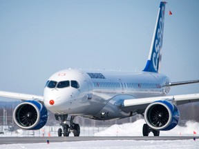 Bombardier's CS300 jet makes a test flight at Mirabel Airport in Mirabel, Que. in this February 27, 2015 file photo. (Postmedia Network file photo)