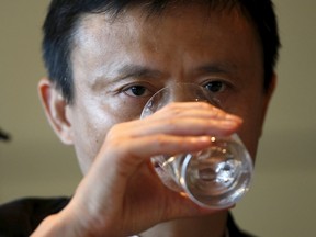 Alibaba founder and chairman Jack Ma drinks water during his news conference at a hotel in Seoul, South Korea, May 19, 2015. REUTERS/KIM HONG-JI