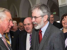 Prince Charles (L) shakes hands with Gerry Adams at the National University of Ireland in Galway, Ireland May 19, 2015.       REUTERS/Adam Gerrard/pool