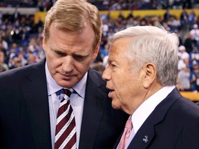 New England Patriots owner Robert Kraft (L) has the ear of NFL commissioner Roger Goodell before the start of the  NFL Super Bowl XLVI football game against the New York Giants in Indianapolis, Indiana, February 5, 2012. (REUTERS/Jeff Haynes)