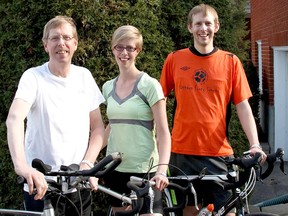Wallaceburg, Ont., resident Dick Bulsink, left, and his daughter Deanna and son, Paul, will be cycling 860 kilometres from Jasper, Alberta to St. Mary's Lake, Montana from July 30 to Aug. 8, 2015 to raise money for World Renew, a poverty and disaster relief organization of the Christian Reformed Church of North America. (Handout/Chatham Daily News/Postmedia Network)
