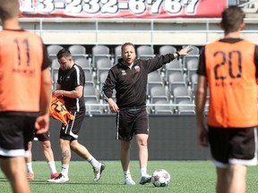 Ottawa Fury FC Marc Dos Santos speaks to his players during Tuesday's practice at TD Place. (Chris Hofley/Ottawa Sun)