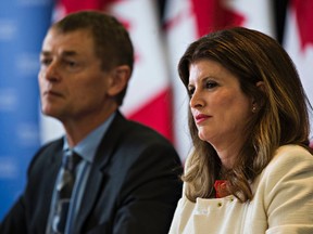 Dr. Gregory Taylor, Chief Public Health Officer of the Public Health Agency of Canada, left, and Rona Ambrose, Federal Minister of Health, during a symposium with stakeholders on the prescription drug abuse at the Delta Edmonton Centre Suite Hotel in Alberta in Edmonton, Alta. on Tuesday, May 19, 2015. Codie McLachlan/Edmonton Sun/Postmedia Network