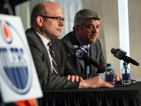 Edmonton Oilers new coach Todd McLellan (right) and general manager Peter Chiarelli are seen during a news conference announcing his hiring at the Fairmont Hotel MacDonald in Edmonton, Alta., on Tuesday May 19, 2015. Ian Kucerak/Edmonton Sun