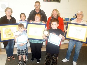 A.A. Wright students Kayla Sands, Riley Vannatter and Xander Williams were presented with Susan Talach Reading Awards for their love and enthusiasm for reading. The awards were annually handed out at D.A. Gordon Public School but are now given out at A.A. Wright Public School, as D.A. Gordon closed in June of 2014. Presenting the awards are members of the Susan Talach Memorial Book Fund committee. The committee also held a art contest for A.A. Wright's learning commons.