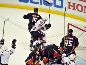 Chicago Blackhawks center Marcus Kruger (16) celebrates after scoring the game-winning goal against the Anaheim Ducks in the third overtime period in game two of the Western Conference Final of the 2015 Stanley Cup Playoffs at Honda Center. Mandatory Credit: Gary Vasquez-USA TODAY Sports