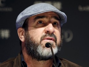 French actor and former soccer player Eric Cantona attends a news conference ahead of the Laureus World Sports Awards ceremony in Shanghai April 14, 2015. REUTERS/Aly Song
