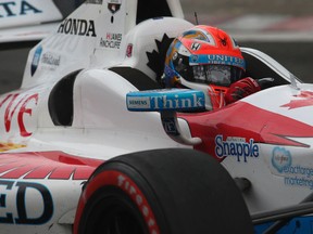 Canadian James Hinchcliffe heads around Turn 4 during the Honda Indy Toronto July 20, 2014. (Postmedia Network file photo)