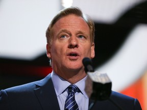 NFL Commissioner Roger Goodell announces that Marcus Peters was picked 18th overall by the Kansas City Chiefs during the first round of the 2015 NFL Draft at the Auditorium Theatre of Roosevelt University on April 30, 2015. (Jonathan Daniel/Getty Images/AFP)