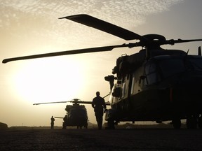This file picture dated on January 2, 2015 shows French helicopters stationed at a base in Goa, 320 km east southeast of Timbuktu, as part of the Barkhane Operation. French special forces killed two key jihadist leaders in a raid in Mali, one of whom has been linked to the kidnapping and execution of foreigners, the defence ministry said on May 20, 2015. France has kept 1,000 troops in northern Mali since operation Serval ousted the Islamist rebels.  AFP PHOTO/DOMINIQUE FAGET