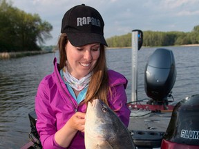 Columnist Ashley Rae holds a sheepshead (or freshwater drum) caught and released in the Bay of Quinte. (Supplied photo)