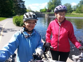 Gillian Huntley and her friend Jane Rau, both cyclists who frequent the path from Bronson Avenue to Hog’s Backs​ along the Rideau Canal, strongly support any barrier being built. On Tuesday, a 63-year-old man was rescued by a cyclist and a jogger after he fell into the canal with his shoe clips still attached. Photo taken on Wednesday, May 20/2015. (Keaton Robbins/Ottawa Sun)