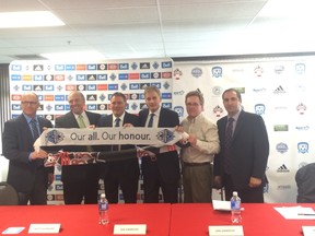 City Councillor Scott Gillingham (left to right), Minister of Tourism Ron Lemieux, Vancouver Whitecaps president Bob Lendarduzzi, Vancouver Whitecaps director of soccer development Dan Lenarduzzi, MSA president Peter Muir and MSA technial director Marinos Papageorgopoulos were on hand for announcement of partnership between the Manitoba Soccer Association and the Vancouver Whitecaps.