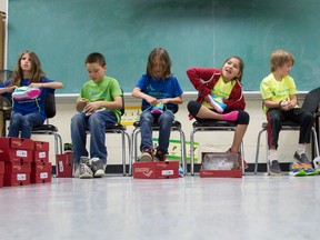 Trafalgar public school pupils Summer Nicholas, 10, left, Aedin Ireland, 10, Savana Nicholas, 9, Michelle Myles, 8, Matthew Lundrigan, 7, and Torren Ferguson, 8. (CRAIG GLOVER, The London Free Press)