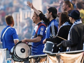 FC Edmonton fans are seen during Game 2 of the Amway Canadian Championship semifinal versus the Vancouver Whitecaps at Clarke Stadium in Edmonton, Alta., on Wednesday May 20, 2015. Ian Kucerak/Edmonton Sun/Postmedia Network