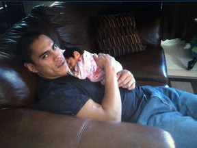 Facebook image
Percy Simon of Buzwah, on the Wikwemikong First Nation, holds daughter Emma.