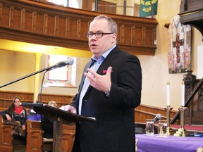 Sarnia-born political writer Paul Wells is shown in this file photo speaking at the Central Forum speakers' series on Thursday May 21, 2015 in Sarnia, Ont. Wells was recently honoured with a medal from the Polish government. File photo/Sarnia Observer/Postmedia Network