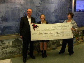 ERNST KUGLIN/THE INTELLIGENCER
Chloe Graham, a Grade 12 student at St. Paul Secondary School, presented Trenton Memorial Hospital Foundation chair John Smylie and executive director Wendy Warner with a cheque for $11,000, money raised at the school’s Colour Challenge event held last week. The presentation was made Thursday at the Foundation’s annual donor appreciation event.