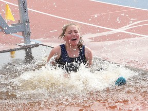 St. Benedict Bears athlete MacKenzie Crowther competes in the open girls 1,500 metre steeplechase race on Thursday. John Lappa/The Sudbury Star