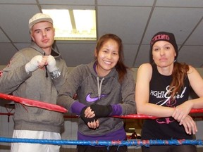 River City Boxing Club members, from left Ryan Huggett, Dylan Taylor, Sereena Nahmabin, Mandy Taylor and Blake Loxton, stop for a photo during a training session on Wednesday May 20, 2015 in Sarnia, Ont. (Terry Bridge/Sarnia Observer/Postmedia Network)