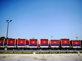 Canada post trucks. 

REUTERS/Mark Blinch