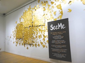 The hundreds of golden birds in this artwork, shown at the Arts Project as part of an exhibit called See Me, represent the missing and murdered aboriginal girls and women in Canada. The exhibit was created to draw attention to those girls. (photo by Glen Pearson)