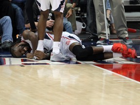 Hawks forward DeMarre Carroll suffered a sprained knee against the Cavaliers on Wednesday and is questionable for Game 2. (USA TODAY SPORTS)