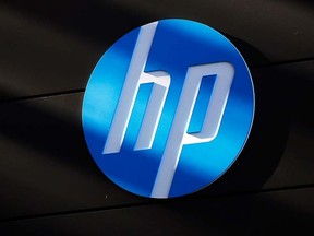 A Hewlett-Packard logo is seen at the company's Executive Briefing Center in Palo Alto, Calif., in this file photo from Jan. 16, 2013.  REUTERS/Stephen Lam/Files