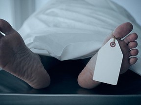 A Wisconsin man pronounced dead in his apartment was about to be sent to the morgue when he started moving his limbs and resumed breathing. (Fotolia)