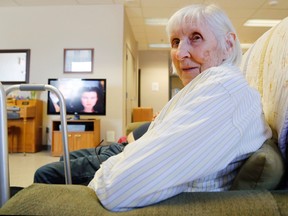 Luke Hendry/The Intelligencer
Helen Bennett sits at the VON office, in Belleville, while watching a movie during a new respite program Friday. The weekend program offers overnight stays and daytime activities so caregivers can take a break.