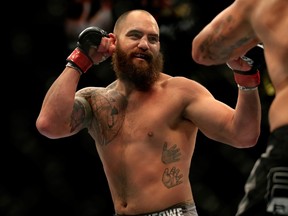 Travis Browne punches Brendan Schaub in their fight during the UFC 181 event at the Mandalay Bay Events Center on December 6, 2014 in Las Vegas, Nevada.  Alex Trautwig/Getty Images/AFP