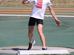 Olympic 800-metre runner Geoff Harris took a shot at a different sport Friday, May 22, 2015, at an event held at Foote Field to count down to Edmonton's hosting nine days of track and field this summer. DAVE LAZZARINO/EDMONTON SUN