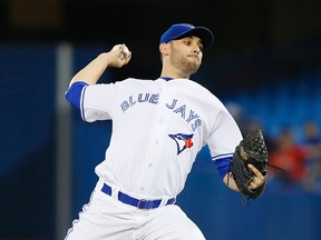 Toronto Blue Jays starting pitcher Marco Estrada (25) pitches against the Seattle Mariners in the first inning at Rogers Centre on May 22.  John E. Sokolowski-USA TODAY Sports