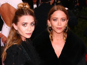 Mary-Kate and Ashley Olsen arrive at the Metropolitan Museum of Art Costume Institute Gala 2015 celebrating the opening of "China: Through the Looking Glass," in Manhattan, New York May 4, 2015.