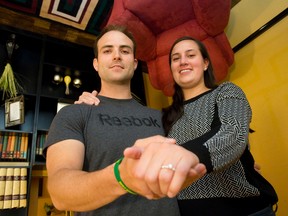 Ehren Scheffler proposed to girlfriend Jocelyn Prosser using an elaborate puzzle and this upside-down room at Escape Canada on York St. Friday. (CRAIG GLOVER, The London Free Press)