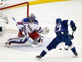 New York Rangers goalie Henrik Lundqvist (30) makes a save against Tampa Bay Lightning center Alex Killorn (17) in the second period in game four of the Eastern Conference Final of the 2015 Stanley Cup Playoffs at Amalie Arena on May 22.  Reinhold Matay-USA TODAY Sports