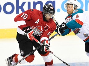 Anthony Duclair of the Quebec Remparts takes on Kelowna's Madison Bowey during Game 1 of the Memorial Cup on May 22. (Aaron Bell, CHL Images)